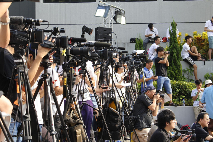journalist camera reporting